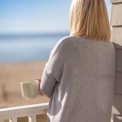 woman enjoying New Seabury beach